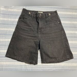 So black denim long shorts.